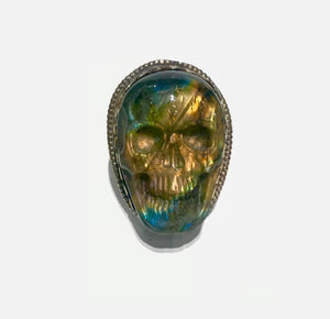 Adjustable brass ring adorned with hand carved colorful labradorite skull