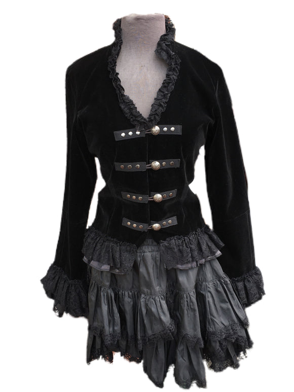 A cute cropped hoodie made of a beautiful black velvet with a decorative tie at the neck.  