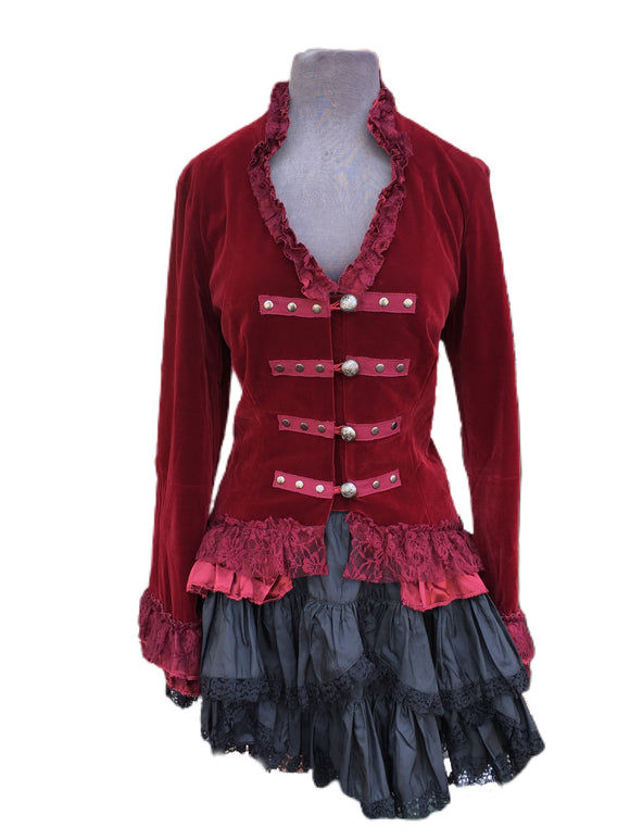 This red velvet tailcoat comes with silver buttons in front and an adjustable back just in case you want to cinch that waistline! 