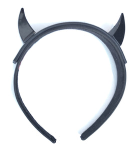 Metal horns on leather and cloth headband