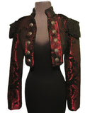 European cut, women’s formal riding jacket. Beautiful short jacket with a stand-up collar made in rich tapestry fabric. Ten medieval lion buttons fasten front lapels which also can be unbuttoned and worn crossing over in double-breasted style. Matching smaller buttons fasten cuffs. Ornate bullion fringe epaulets add an authoritarian vibe. Lined in rich black satin. Wonderful!  Measurements:  Small Ð Chest 34-36_ Shoulders (from shoulder seam to shoulder seam across upper back) 15_ 