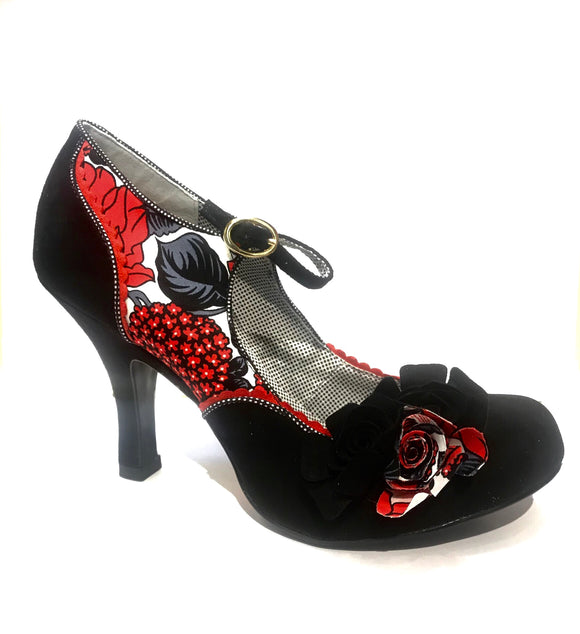 Pin up style with red and black floral decorations and faux black rose accents