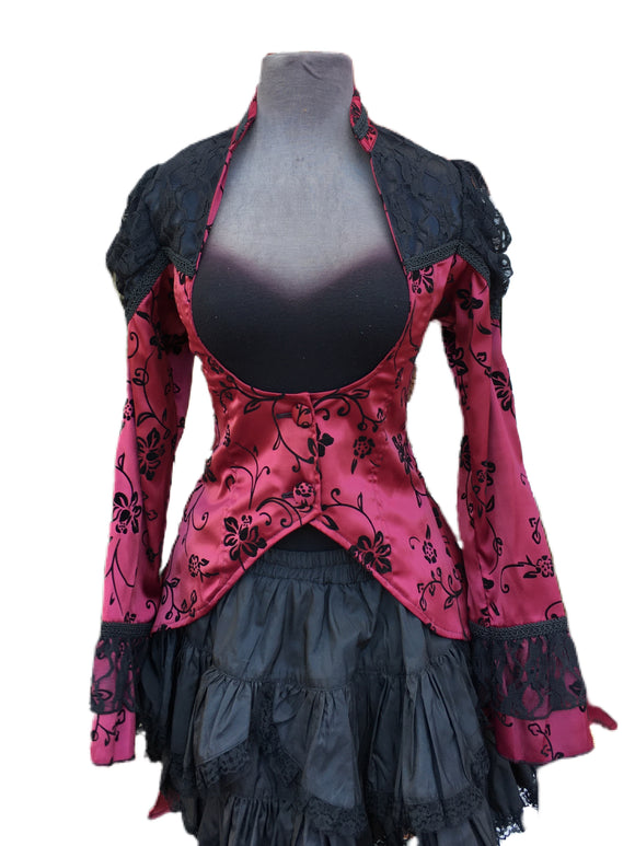 A beautiful velvet tailcoat with lace shoulders for your inner vampire.  Tailcoat fastens under the bust with two velvet buttons.  Red and black.